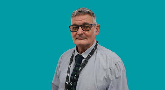 One of Berneslai Homes' Board members, Gez Morrall, superimposed on a light blue background.