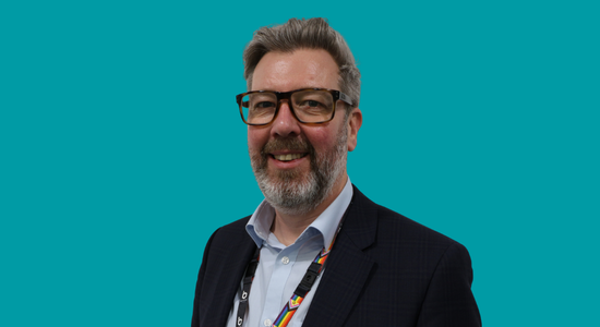 One of Berneslai Homes' Board members, Adam Hutchinson, superimposed on a light blue background.