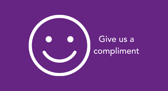 A smiling emoji with the caption 'Give us a compliment'.